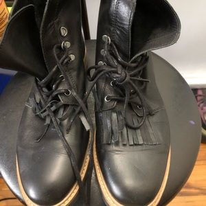Zara black leather boots with some fridge detail.